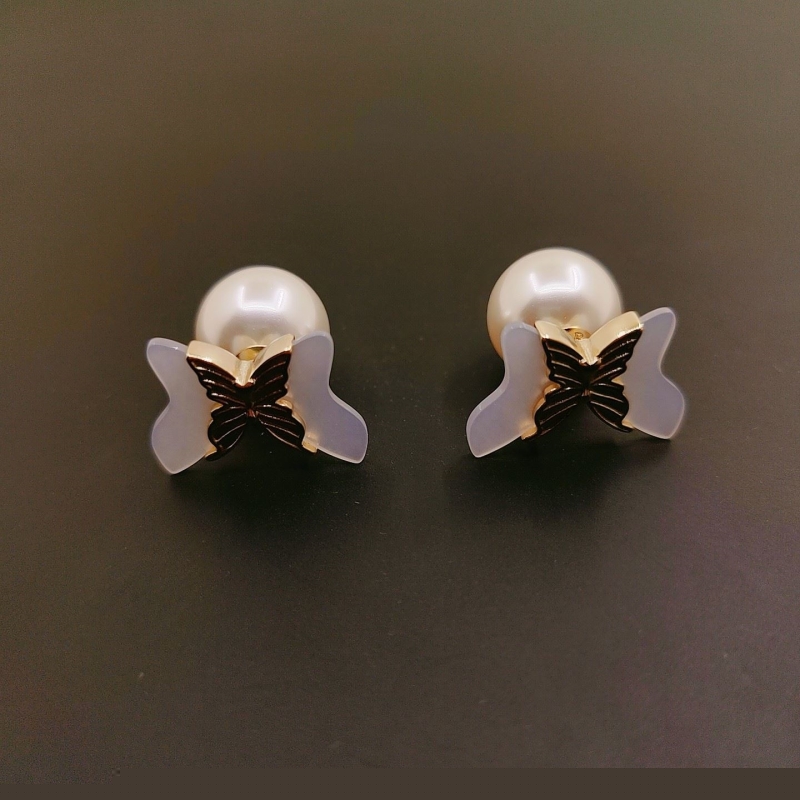 ch**an D*or earrings